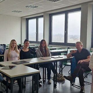 Personen in Hörsaal